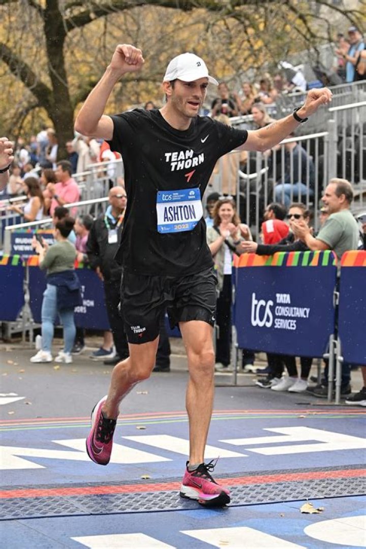 
Mila Kunis Says Ashton Kutcher Is Training Their Kids for a 5K After Inspirational NYC Marathon Run 